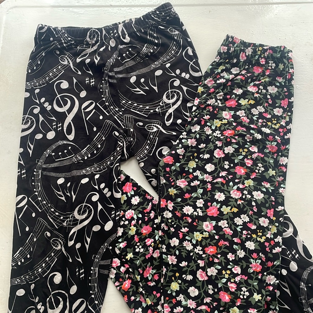 Two pairs Agnes & Dora S/M adult leggings fit US sizes 4-12. Very good condition